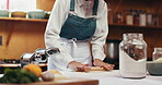 Rolling, dough and hands with food, kitchen and meal prep with pasta maker, culinary and restaurant. Hospitality, chef and person with equipment for ramen, ingredients and skills in small business
