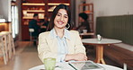 Face, confident and happy woman in coffee shop for remote work, financial stats and tablet. Customer, portrait and freelancer in cafe with tech for investment analyst, digital chart and arms crossed