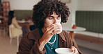 Drinking, tea and man in cafe for peaceful morning, contemplating and relax on weekend. Reflection, thoughtful person and student in shop with hot beverage for breakfast, wellness and rest on break.