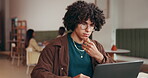 Education, typing and man with laptop in coffee shop, reading digital notes and studying for scholarship. Thinking, research and college student with pc in cafe, learning or knowledge for assignment.