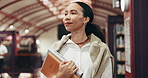 College, woman or walking with books in library for thesis research, study resources or education. University student, person or search textbooks on campus for PHD assignment, knowledge or literature