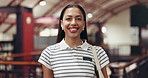 Face, student and woman in library, university and education with scholarship, learning and college. Happiness, academic and person with confidence, knowledge and growth with books, studying or pride