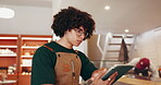 Thinking, man and reading at restaurant with tablet, menu development and planning for small business. Research food trend, tech and entrepreneur in kitchen, recipe creation and culinary innovation.