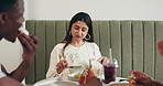 Woman, friends and conversation at lunch, restaurant and happy with funny memory, story or gossip. People, group and men with food, relax or laugh in discussion, bonding or chat for reunion at diner