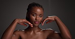 Beauty, face and black woman with skincare in studio for natural glow, healthy skin and hydration. Dermatology, person and confidence on dark background for collagen treatment results and self care