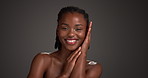 Face, smile and skincare with black woman in studio for dermatology, glow and self care. Happy, shine and smooth skin with female person on dark background for space,  cosmetology and beauty