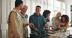 Big family, cooking and stirring food at house with discussion, meal prep and thanksgiving. People, talking and chop vegetables, hug child and culinary skills with social gathering of holiday reunion