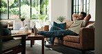 Man, stretching and relax on couch at house for peace, weekend break and afternoon nap. Male person, rest and sleeping on sofa for stress relief, unwind and comfortable for feel good in living room