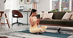 Happy woman, phone and texting on yoga mat in home, meme and contact on floor in living room. Person, smartphone and laugh with tablet, mobile app and break with online fitness class at apartment