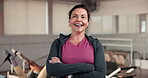 Face, personal trainer and mature woman with arms crossed in gym for training, pride and ready to coach. Confident, client advice and people in fitness studio to exercise, wellness workout and sports
