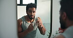 Getting ready, confident or man by mirror in bathroom, facial inspection or grooming routine for day. Reflection, self care or proud person with beard check in home, clean shave or morning hygiene.