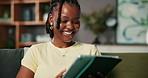 Tablet, smile and black woman on sofa in home with research, blog or ebook on weekend. Digital technology, happy and African female person with social media on app in living room in apartment.