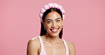 Skincare, happy or woman face with headband in studio, natural glow or beauty routine for facial shine. Dermatology, smile or person with hair band for self care, cosmetic or space on pink background