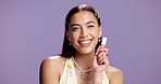 Woman, smile or face in studio with lip gloss, make up or radiant in mockup space. Happy, confident person or model for beauty with purple background, cosmetic or brand advertisement for trends