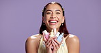Skincare, happy and woman in studio with mockup space for product placement for advertising. Smile, containers and portrait of female person with facial moisturizer for glow by purple background.