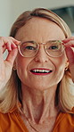 Face, smile and old woman with glasses, clear vision and optometry with fashion lens. Optometrist, ophthalmologist and mature person with eye exam clinic, prescription and pensioner with spectacles