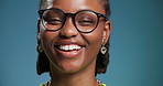Glasses, happy and face of black woman in studio for vision health, eye care and confidence. Mockup space, lens prescription and ophthalmology with person on blue background for frames and eyewear