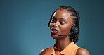 Talking, call center or black woman with headset in studio, online communication or technical support. Speak, mic or agent with tech for conversation, mockup space and contact us for customer service
