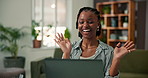 Laptop, video call and wave with black woman on sofa in living room of home for discussion. Computer, greeting and virtual meeting with happy African freelancer is apartment for communication