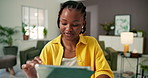 Tablet, living room and black woman with social media, scroll and student reading online article for college. African person, internet and scholarship opportunity with web app, tech and email in home