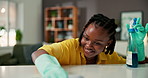 Spray, cleaning table and black woman in living room to remove dust, dirt or bacteria for health or wellness. African person, cloth sanitize and happy student with chores for hygiene with detergent