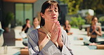 Meditation, breathing and prayer hands with woman in class for spiritual retreat, namaste and balance. Zen exercise, holistic healing and yoga with people for mindfulness, peace and self care mindset