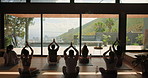 Back, people and meditation with instructor for yoga, holistic fitness and spiritual balance in class. Group, community and namaste pose for inner peace, mindfulness and session of wellness technique