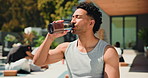 Drinking, water and man on break, fitness and prevention of dehydration with beverage and nutrition. Thirsty, athlete and person with liquid for hydration, wellness and body regulation with minerals