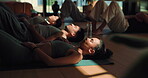 Meditation, relax and floor with woman in class for balance, chakra alignment and mental health. Wellness, holistic healing and peace with group of people in yoga studio for awareness, zen and soul