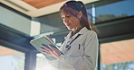 Tablet, woman and doctor in hospital for writing notes with medical research or information. Digital technology, professional and female healthcare worker planning diagnosis or treatment in clinic.