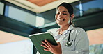 Healthcare, laughing and tablet with woman doctor in hospital for insurance or telehealth. App, medical and planning with funny medicine professional in clinic for diagnosis, results or review