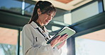 Smile, doctor and woman with tablet in hospital for email, research or scroll medical records. Digital technology, healthcare professional and clinic schedule for wellness, telehealth info and report