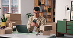Small business, boxes and man with smartphone, laptop and preparing for order on web or distribution. Entrepreneur, typing and person with tech for online shop, ecommerce and planning for logistics