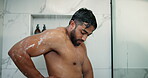 Soap, morning and shower with man in bathroom for body care, skincare routine and water splash. Beauty hygiene, glow and dermatology with person washing in home for cleaning, grooming and hydration