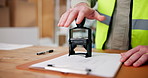 Clipboard, hands and stamp with logistics employee in warehouse for delivery documentation. Paperwork, signature and verification with person in distribution depot for supply chain management