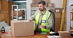Logistics, packaging or man with sticker in warehouse for  distribution, product or shipping process. Order delivery, transport box or person with address label for courier, supply chain or dispatch.