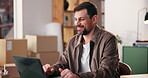 Laptop, logistics and typing with happy man in office for delivery, distribution or shipping management. Computer, online order and supply chain with person at desk for courier service or schedule