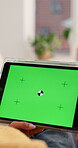 Hands, green screen and woman on couch with tablet, online entertainment or app at home. Advertising, mock up or female person in living room with tech, ux design or digital connection in chroma key.