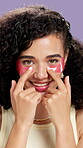 Skincare, face and girl with eye patches in studio for dark circles, hydration or product review. Beauty influencer, gen z person or smile with cosmetic pads on purple background for depuff treatment