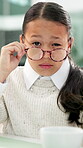 Office, face and child with glasses, doubt and pretend employee with facial expression on career day. Raised eyebrow, suspicious and kid with coffee in business, eyewear and fake question for project