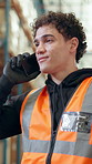 Phone call, shipping and man in warehouse, talking and logistics with communication. Happy person, cellphone and employee with smile, discussion and feedback for inspection, distribution and export
