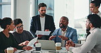 Man, group and laptop at office meeting with discussion, planning and review for solution at insurance company. Business people, team and documents with talk, graphs or insight for risk management