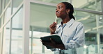 Schedule, tablet and thinking with business black woman in glass office for online planning or research. Agenda, app and writing with African employee in workplace for calendar entry or management