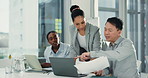 Pointing, business people or laptop in meeting with document, communication or problem solving. Discussion, employees and team collaboration in office with tech, paperwork and information in company.