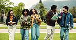 Group, laughing and friends with books, campus or walking at university, happiness and conversation. Education, college students and people with backpacks on break, talk and bonding with funny joke