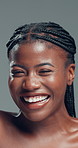Face, funny and skincare with black woman in studio for cosmetics or dermatology satisfaction. Aesthetic, beauty and laughing with happy African model on gray background for benefits or results