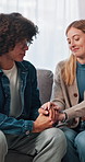 Holding hands, therapist and couple with counseling, love and support with advice. Woman, man and marriage with care, pre marital course and conversation with relationship, trust and consultation
