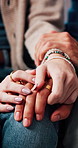 Holding hands, therapy and couple on sofa in session for relationship advice, bonding and trust. Psychology, dating and closeup of people in counseling for emotional support, love and commitment