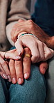 People, holding hands and couple therapy in office, support and consultation with partner and trust. Psychology, services and pre marital counseling for commitment preparation, care and affection