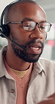Call center, headset and black man with glasses, talking and communication with help desk. African person, reflection or consultant with eyewear, feedback or customer service with advice or questions